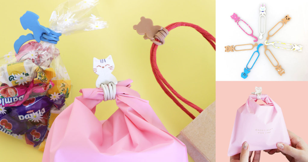 ネコの形の輪ゴムで袋を留めている